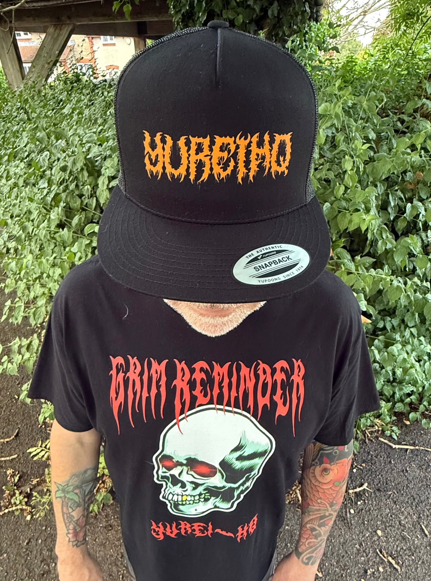 Trucker Cap orange metal logo